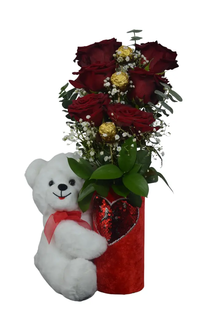 Arreglo de rosas con bombones ferreros en bucaro de oso